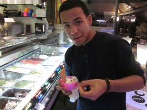 Adrian Liloy enjoys gelato from an Italian cafe.